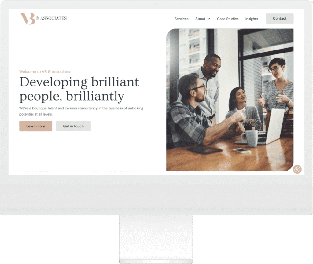 VB & Associates homepage mocked up on a desktop screen.